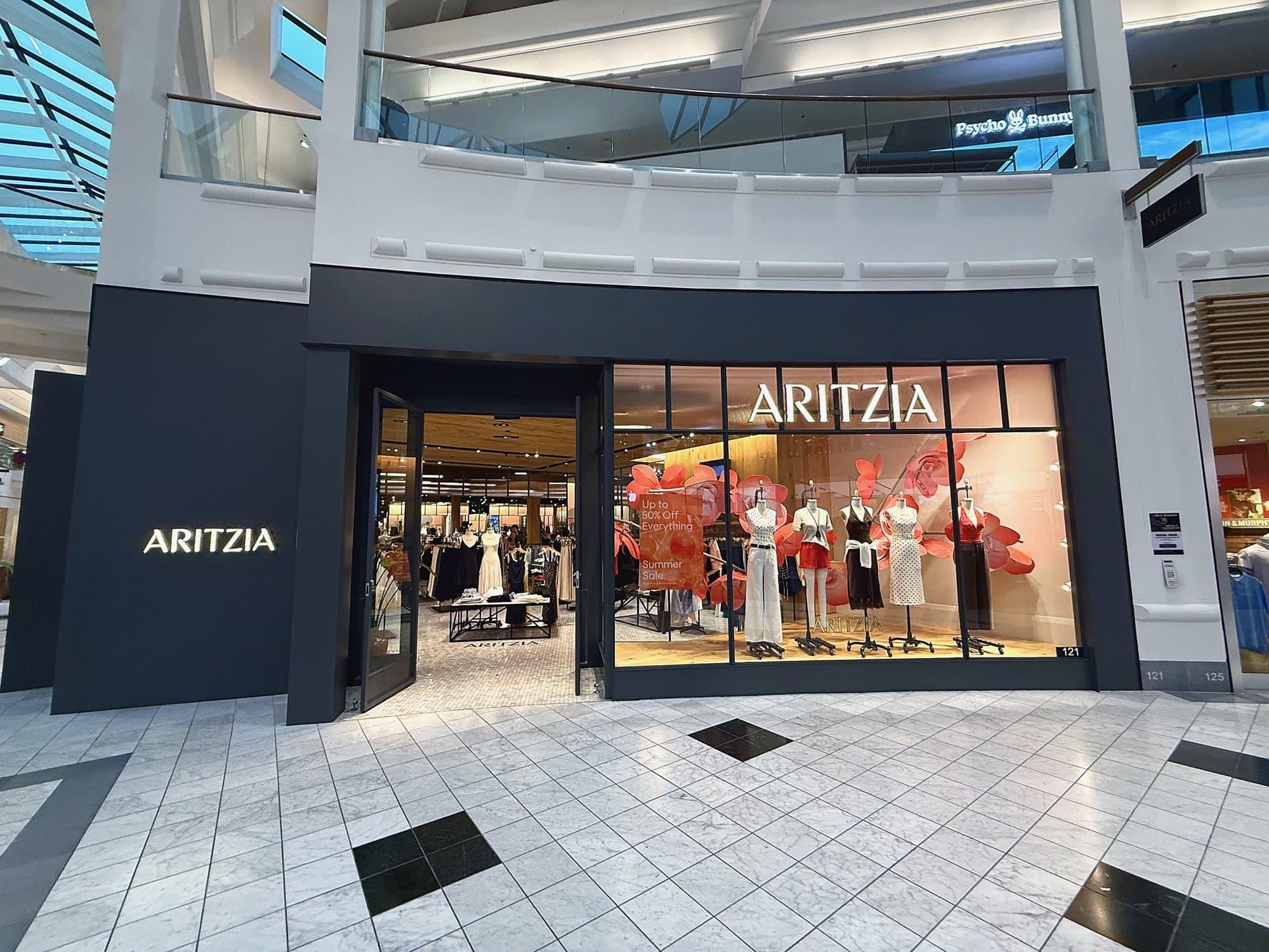 CG Interiors commercial interior buildout — Aritzia retail storefront